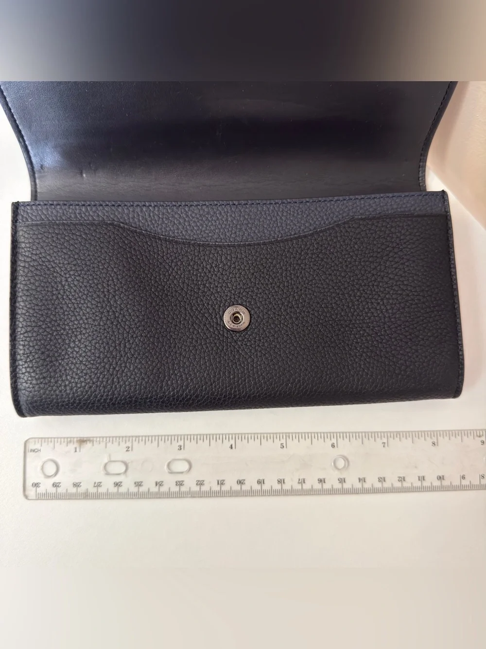 Coach sleek black